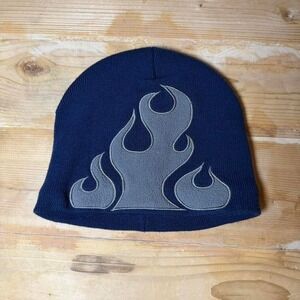 Navy blue knit beanie featuring a bold gray flame
